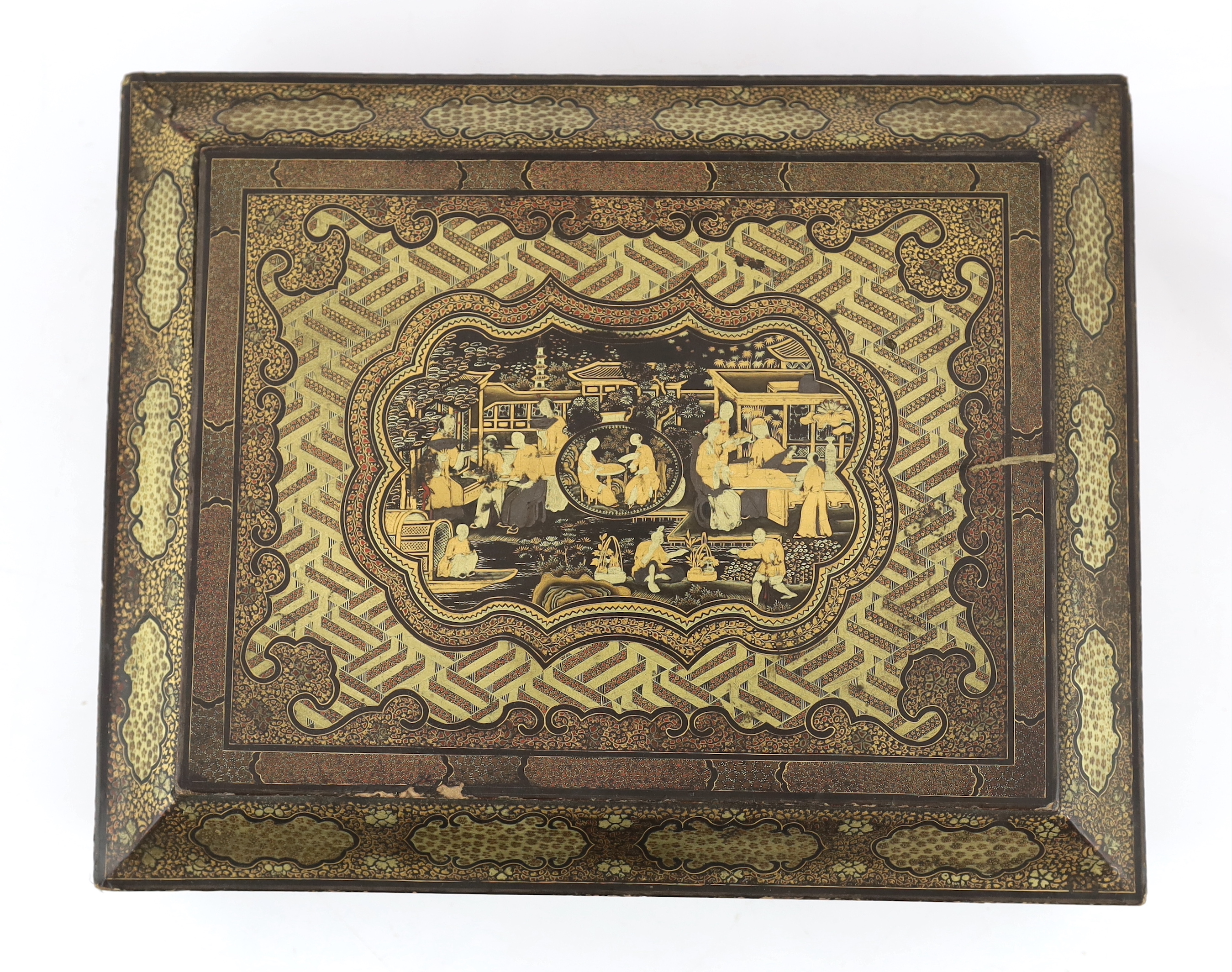 A Chinese gilt-decorated black lacquer games box, mid 19th century